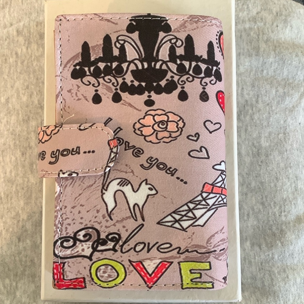 Wallet with cell phone holder. Eiffel Tower.. New in box.